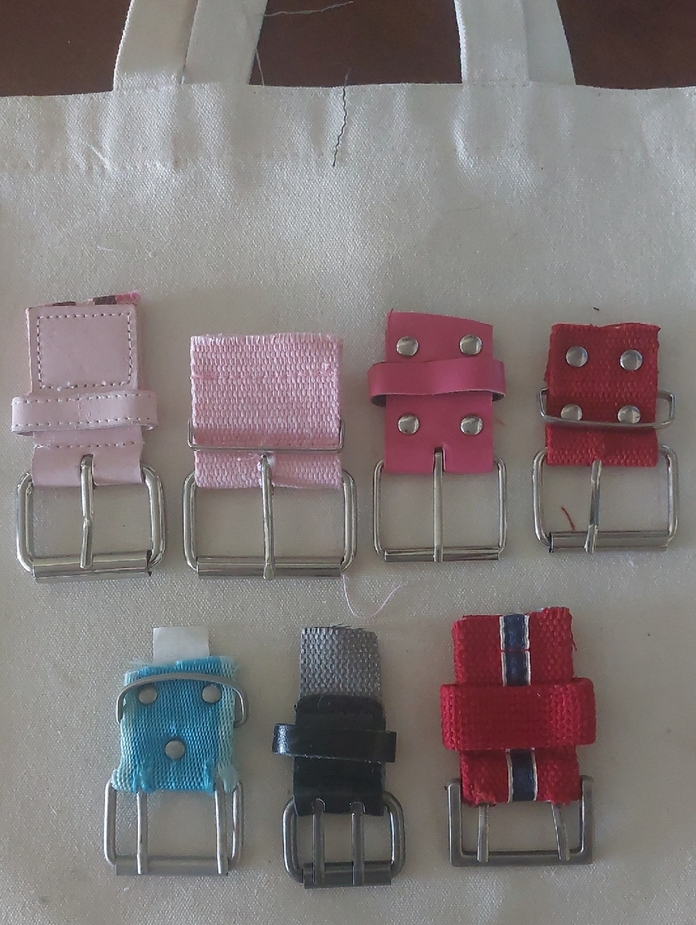 Lot of Seven Roller Belt Buckles, Silvertone Metal